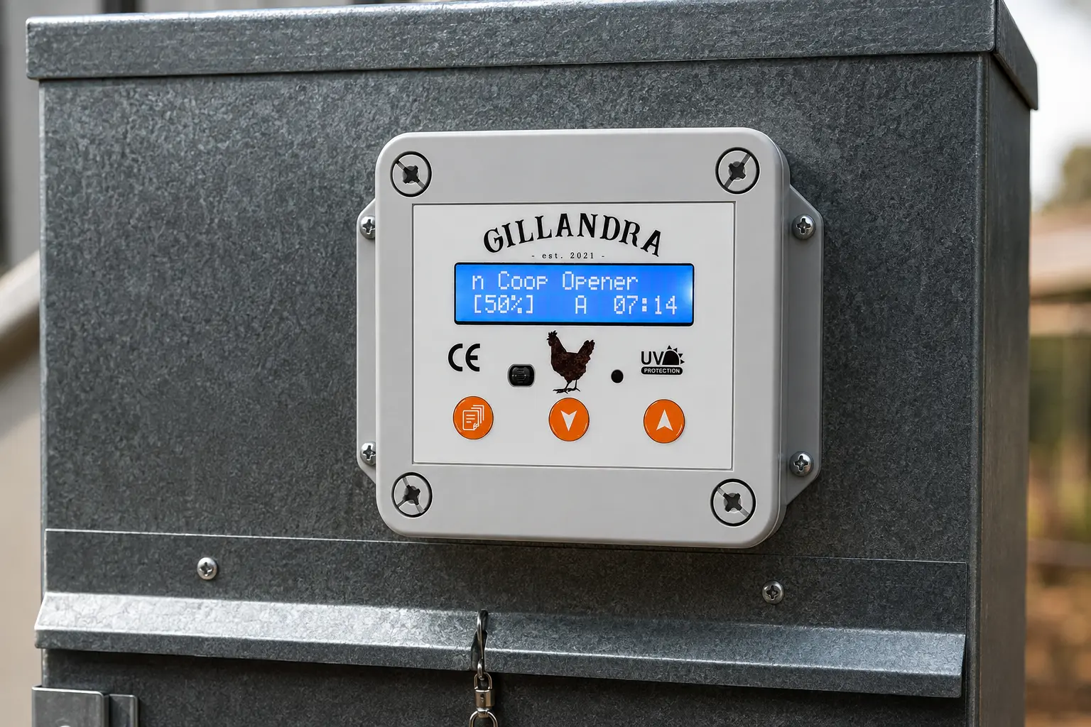 Close-up of the Gillandra automatic chicken feeder’s illuminated LCD controller.